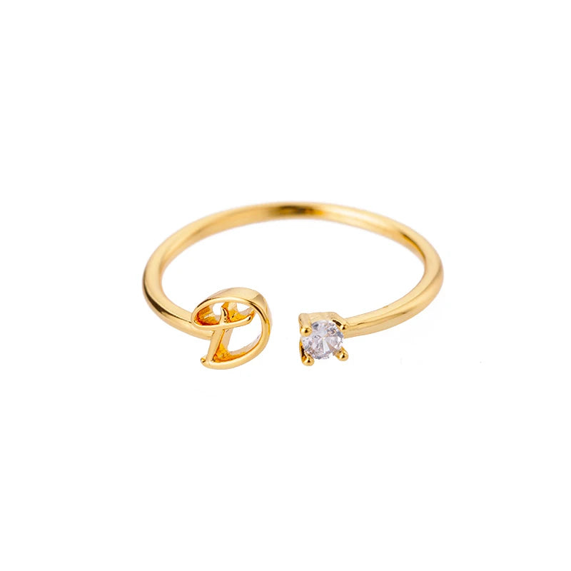 A to Z initial ring for women made of adjustable stainless steel in gold color. A stylish and personal accessory, perfect as a gift or couple jewelry.