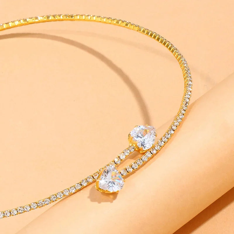 Elegant heart choker necklace with sparkling rhinestones. Minimal, feminine, and perfect for any outfit.