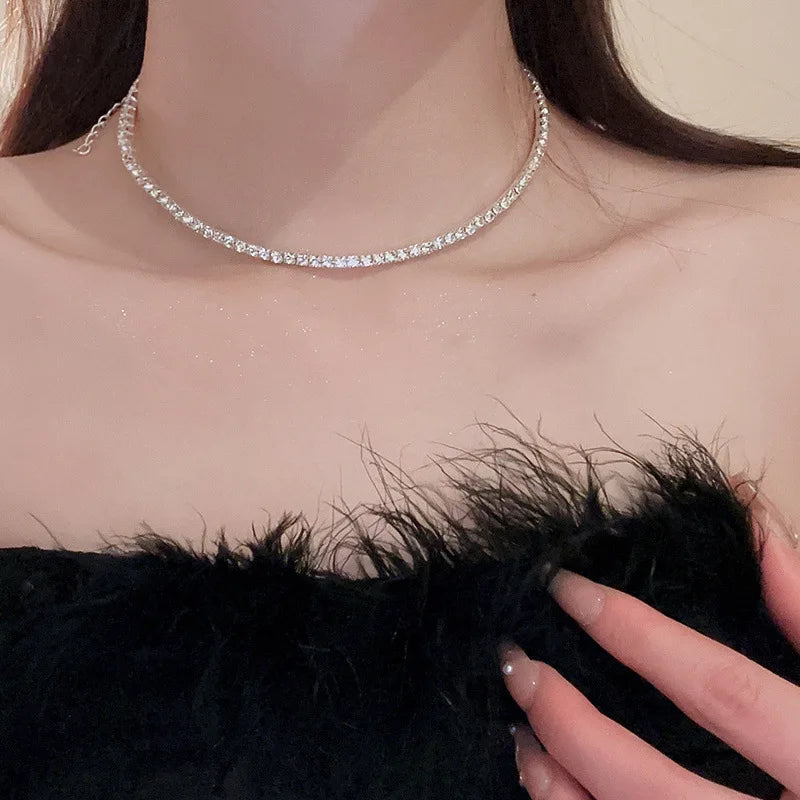 Elegant heart choker necklace with sparkling rhinestones. Minimal, feminine, and perfect for any outfit.