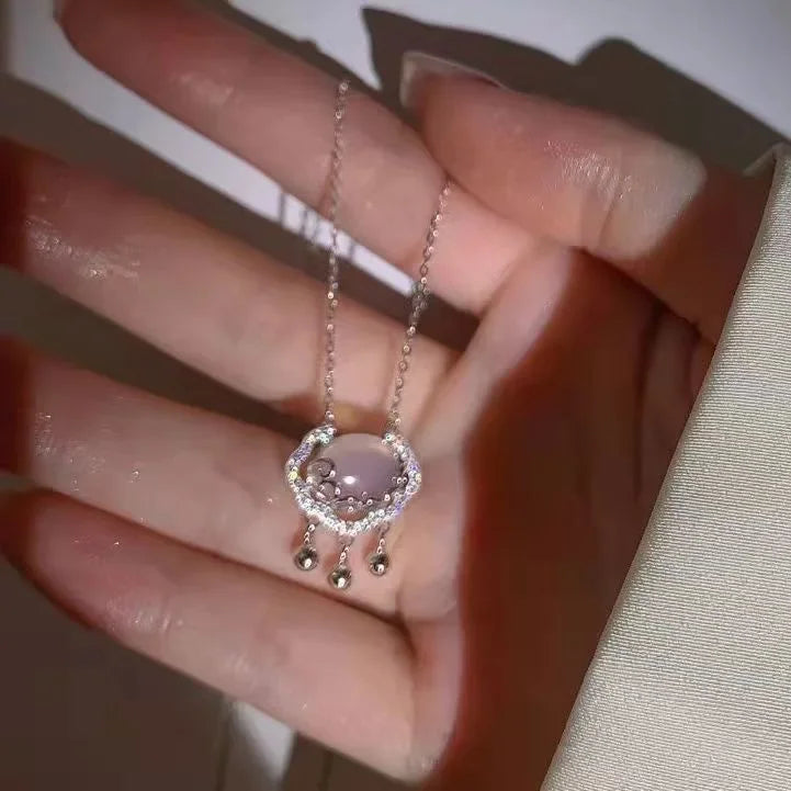 Pink crystal bow knot pendant necklace with rhinestone heart details. A sweet Y2K fairy-style accessory, perfect for girls and women.