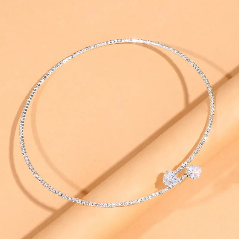 Elegant heart choker necklace with sparkling rhinestones. Minimal, feminine, and perfect for any outfit.
