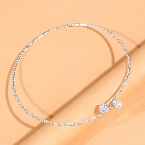 Elegant heart choker necklace with sparkling rhinestones. Minimal, feminine, and perfect for any outfit.