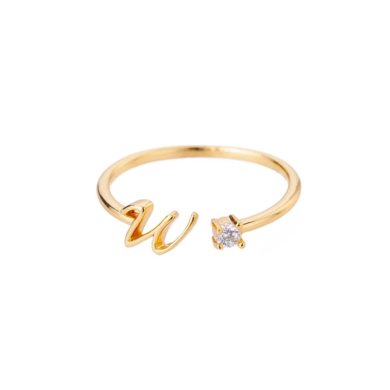A to Z initial ring for women made of adjustable stainless steel in gold color. A stylish and personal accessory, perfect as a gift or couple jewelry.
