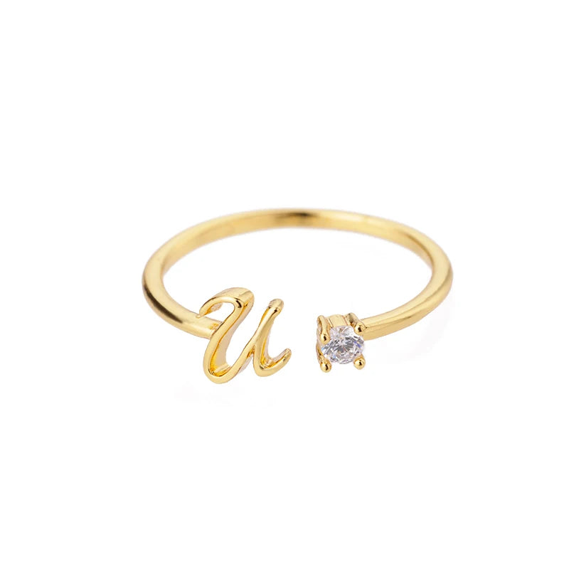 A to Z initial ring for women made of adjustable stainless steel in gold color. A stylish and personal accessory, perfect as a gift or couple jewelry.