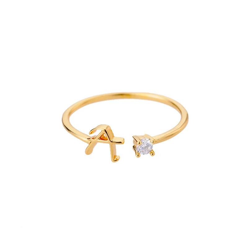 A to Z initial ring for women made of adjustable stainless steel in gold color. A stylish and personal accessory, perfect as a gift or couple jewelry.