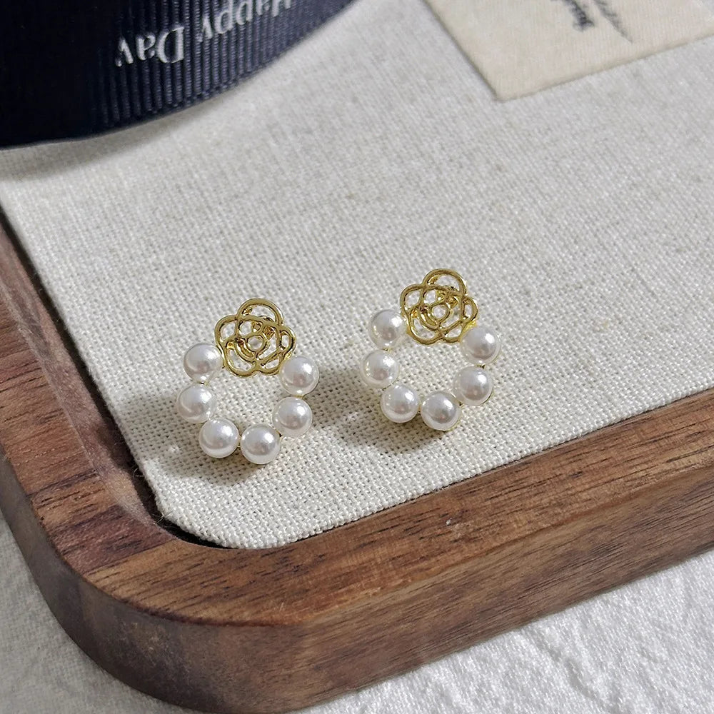 Korean-inspired geometric pearl ear clips with contrast colors. Retro style, no ear piercing required.