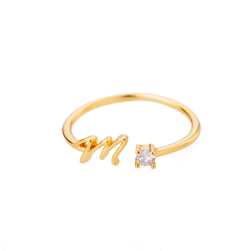 A to Z initial ring for women made of adjustable stainless steel in gold color. A stylish and personal accessory, perfect as a gift or couple jewelry.