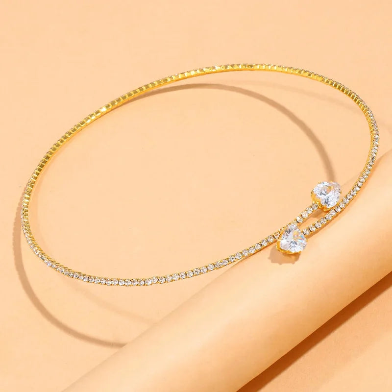 Elegant heart choker necklace with sparkling rhinestones. Minimal, feminine, and perfect for any outfit.