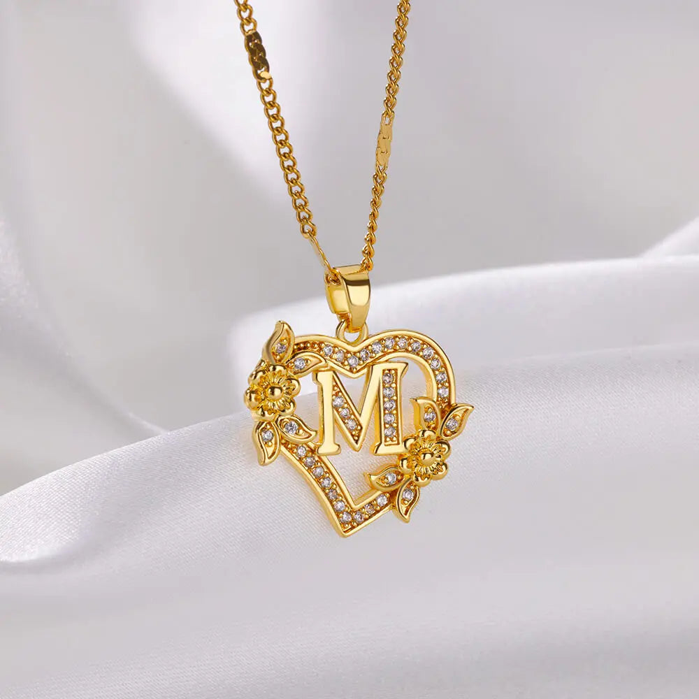 Gold-colored stainless steel heart initial necklace for women – personal, modern, and gift-ready.