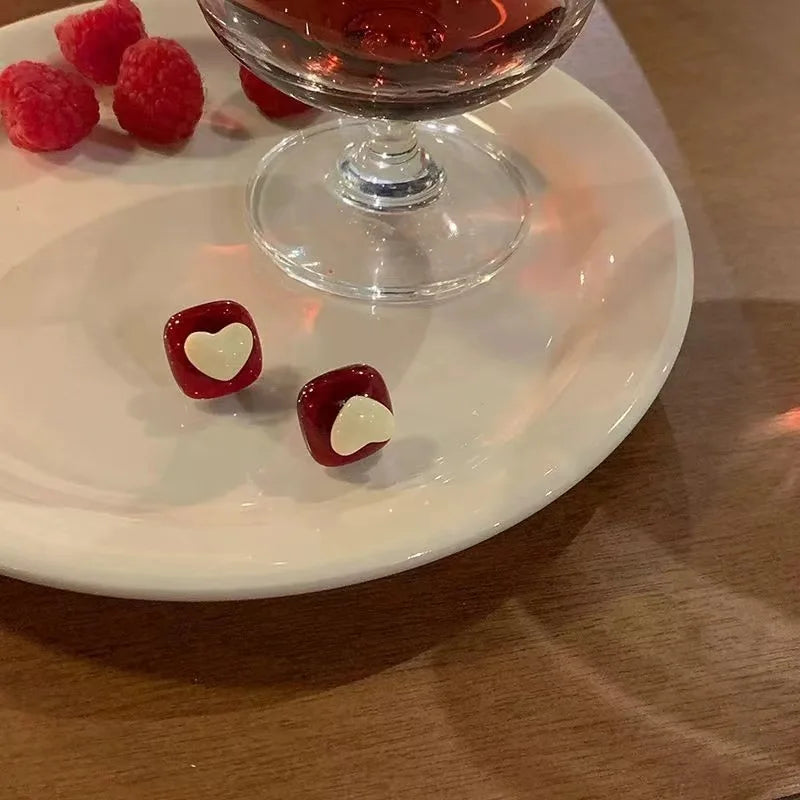 Korean-inspired geometric pearl ear clips with contrast colors. Retro style, no ear piercing required.