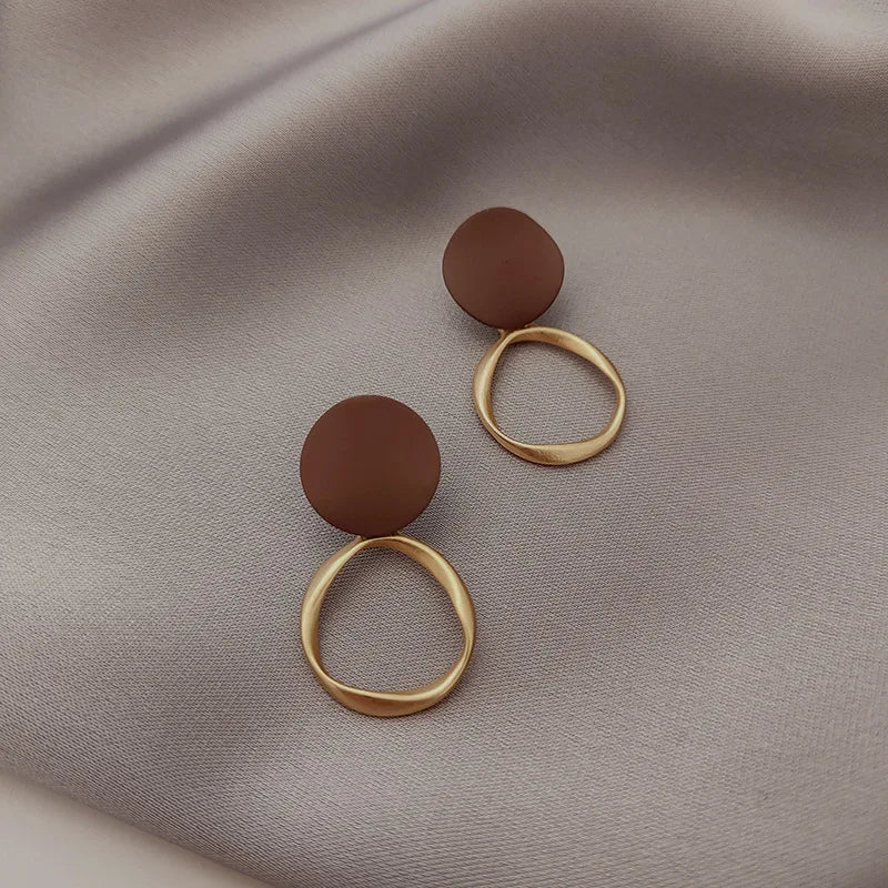 Korean-inspired geometric pearl ear clips with contrast colors. Retro style, no ear piercing required.